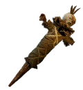 A voodoo-like doll with three tufts of hair from its head and a sharp end at the bottom. This is the Idol of Covert Plots from Avowed