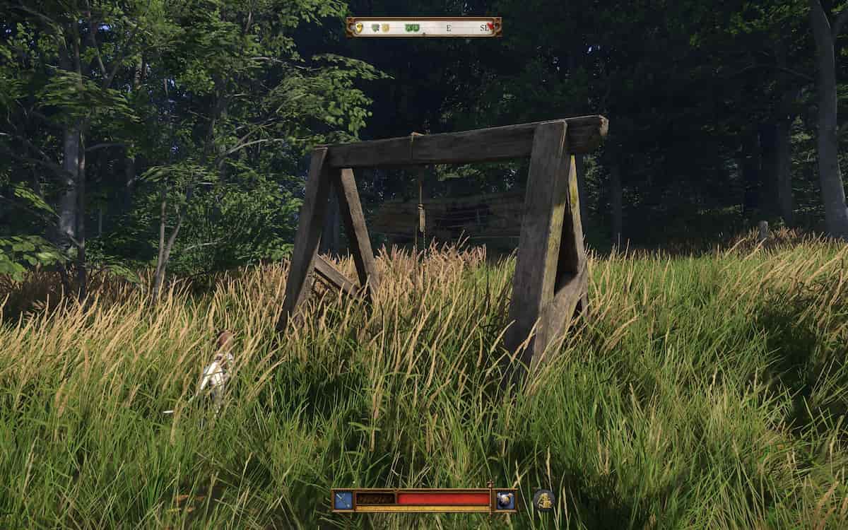 Player character standing in a field with a broken well and a ruined house in the background