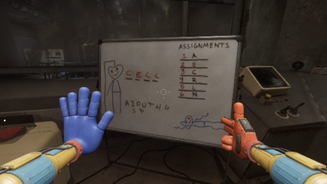 Looking at the whiteboard with a game of hangman and a assignment key next to it