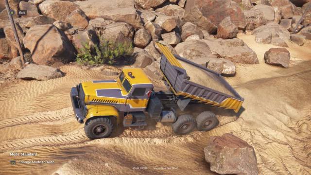 A dump truck in RoadCraft dumping sand onto a road.