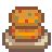 An image of the Crab Cake sprite from Stardew Valley. 