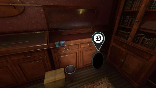 A Haunted Mirror sitting on the ground by a case in Bleasdale Farmhouse in Phasmophobia.