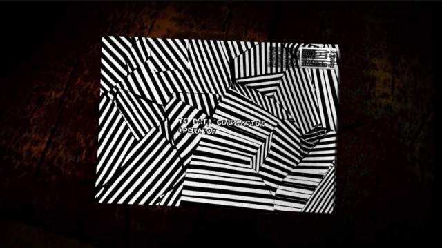 Looking at one of the mysterious letters with stripes all over it, addressed to the Data Correction Officer in DEAD LETTER DEPT