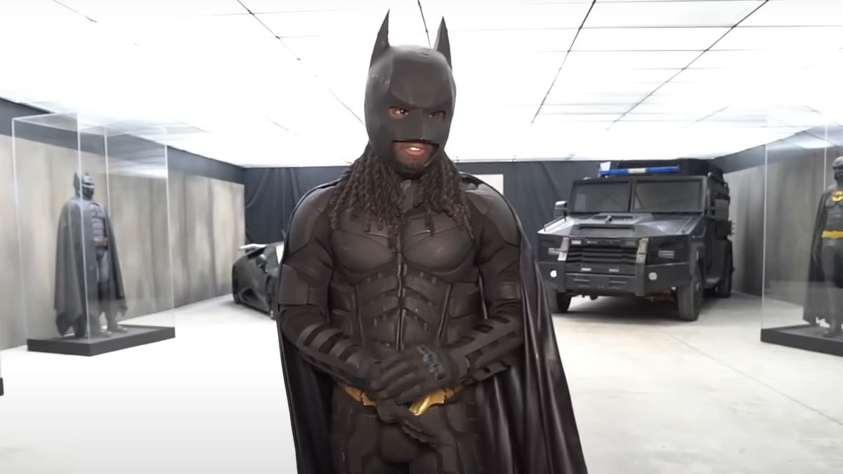 Kai Cenat in a Batman suit