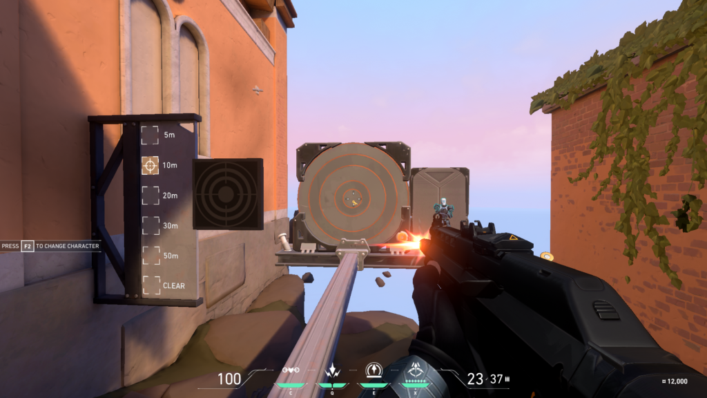 A player shoots at a large target in VALORANT's practice range.