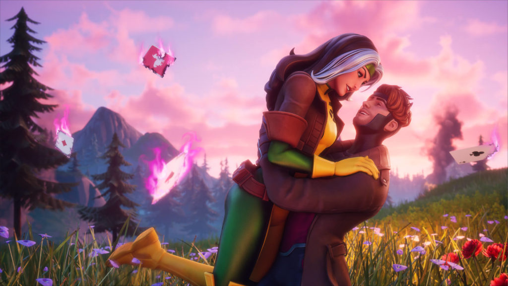 Rogue is being held up romantically by Gambit by her waist with a few cards being burned in the background and floating.