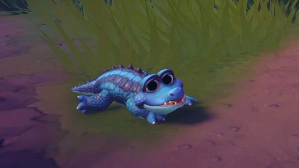 a small blue crocodile in disney dreamlight valley.