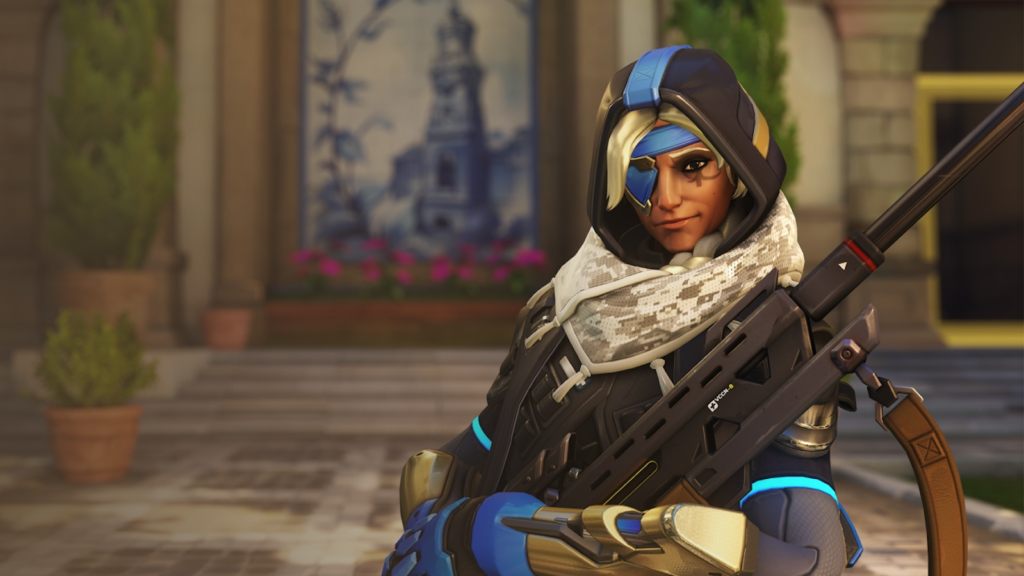 Ana in Overwatch 2 sitting in Spawn with her weapon on Esperança. 